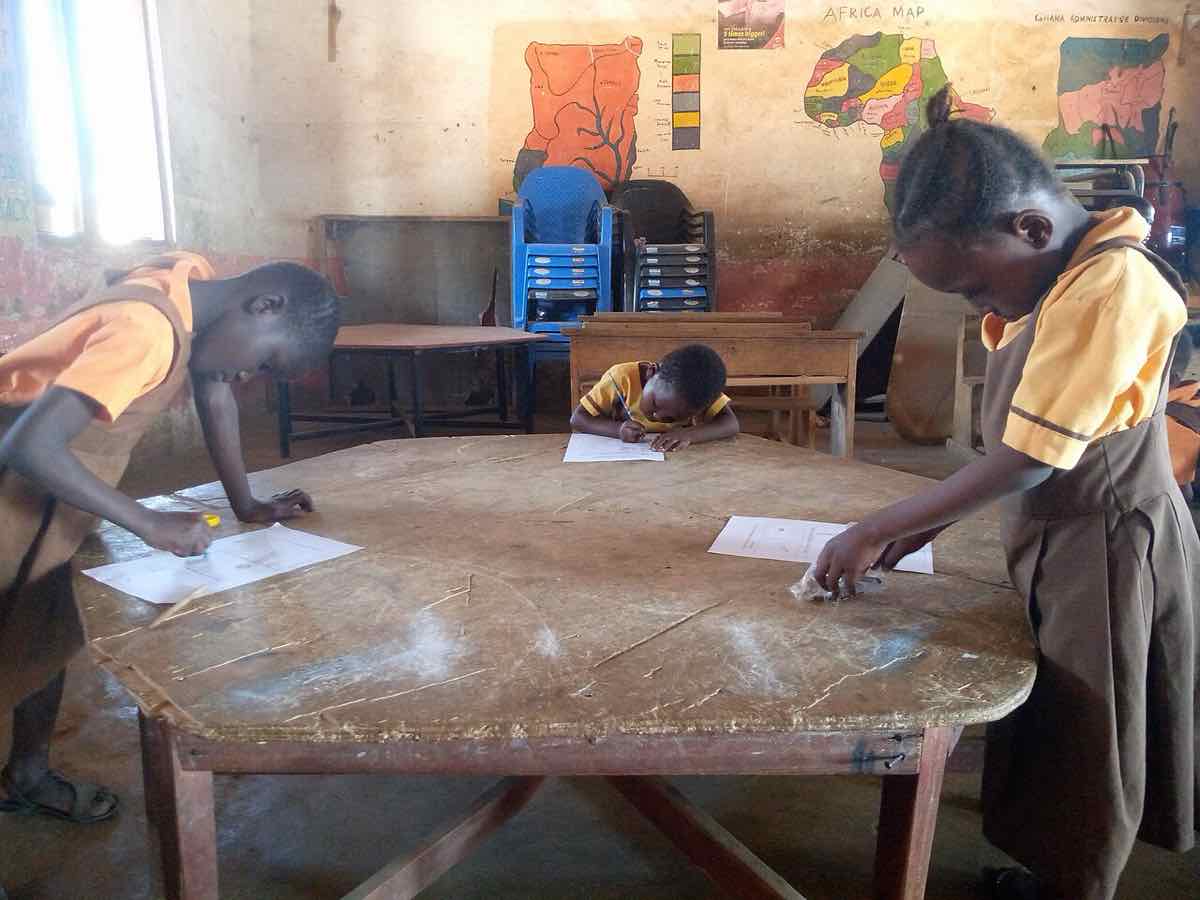 school exam classroom students writing